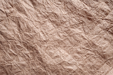 Crumpled kraft paper. Texture crumpled recycled brown paper.