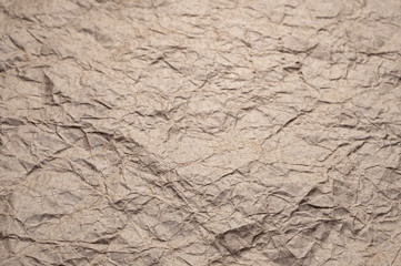 Crumpled kraft paper. Texture crumpled recycled old paper.