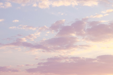 Naklejka na ściany i meble Pink, blue, purple evening sunset sky with cumulus clouds