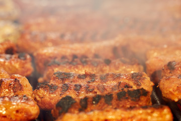 Meat rolls on grill