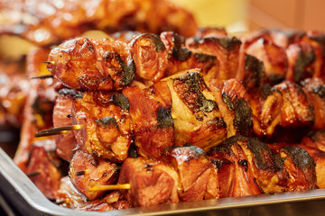 Meat skewers on the grill