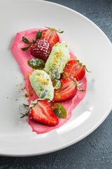 Strawberry dessert with mint.