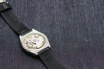 Closeup machine watch using as a background or wallpaper