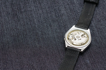 Closeup machine watch using as a background or wallpaper