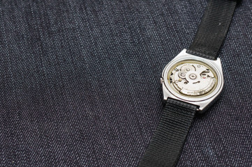 Closeup machine watch using as a background or wallpaper