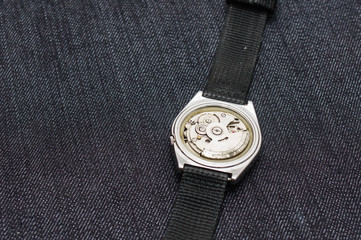 Closeup machine watch using as a background or wallpaper