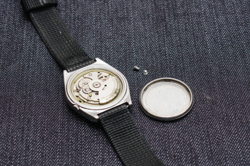 Closeup machine watch using as a background or wallpaper