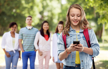education, school and people concept - happy smiling teenage student girl with bag and smartphone over group of friends in summer park background