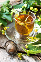 Cup of herbal tea with linden flowers