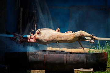 lamb roasting on a spit