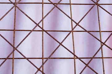 rusty wire grid on a gradient purple background