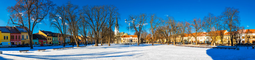 Historic city center of Spisska Nova Ves covered by snow on Christmas time