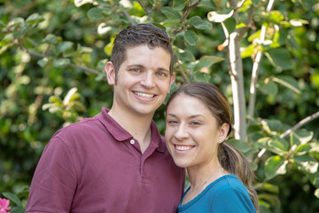 Young Millennial Couple Posing for a Portrait Outside in the Summer