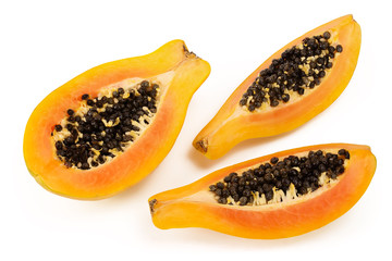 half of ripe papaya isolated on a white background