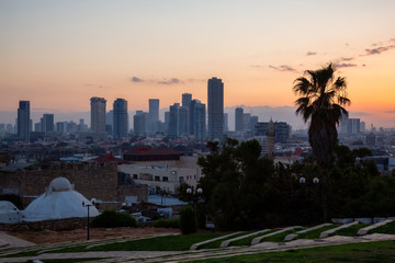 Beautiful view of a modern downtown city during a sunrise. Taken in Jaffa, Tel Aviv-Yafo, Israel.