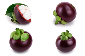 ripe mangosteen with leaves isolated on white background closeup. Set or collection
