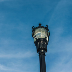 Fototapeta na wymiar Streetlight Against a Blue Sky