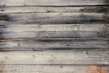 Old wooden unpainted boards. Horizontal view. Background. Texture.