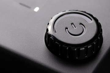 Power control, black button on and off electronic devices.