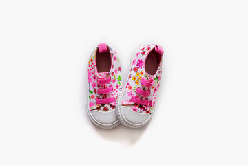 Little baby shoes on a white background