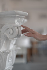Hand touch antique classical columns