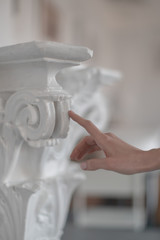 Hand touch antique classical columns