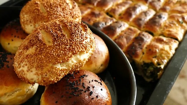 homemade pastries, spinach pie, sesame buns and bagels, Turkish style dough food,