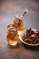 Traditional arabic tea and dry dates