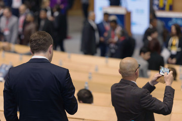 Business Conference and Presentation, Audience at the conference hall, representing model of economic development and startup business