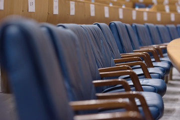 Conference hall or seminar room, row of empty seat in auditorium or hall or classroom.