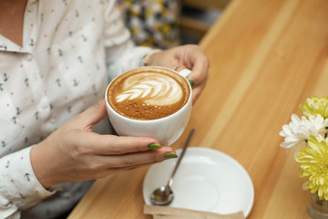 Woman dinner with cheessecake and coffee at restaurant