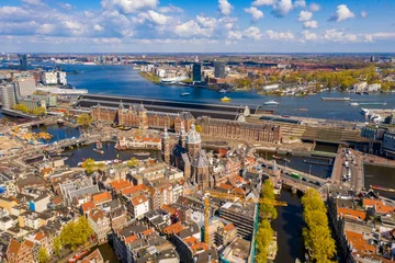Foto op Aluminium Beautiful aerial Amsterdam view from above with many narrow canals, streets and architectures.  © ingusk