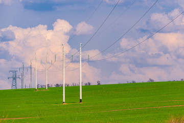 Fototapeta na wymiar High voltage towers with sky background