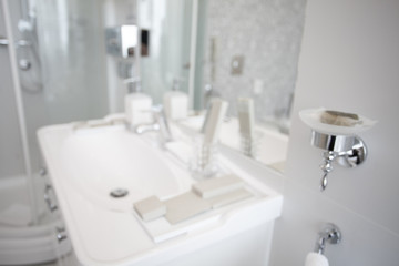 Luxury modern interior of stylish and elegant bathroom in hotel. Private apartment. Water relaxation treatments and spa at home. Minimalistic design in light shades