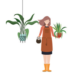 woman with houseplant on macrame hangers