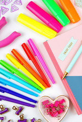 Back to school or workspace colorful stationery overhead flat lay.