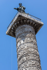 Fototapeta na wymiar Architectural detail from of ancient Marcus Aurelius Column in front of Palazzo Chigi in city of Rome, Italy
