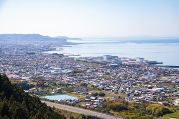 Fototapeta premium Cityscape of shikokuchuo city and coastline of the seto inland sea ,Shikoku,Japan