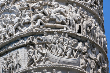 Architectural detail from of ancient Marcus Aurelius Column in front of Palazzo Chigi in city of Rome, Italy - Powered by Adobe