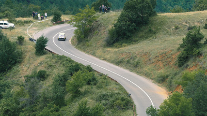 Kocani, Macedonia - 24 Jun, 2018: Custom sport car driving fast on hill climb race on winding mountain road