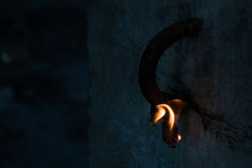 Short circuit, burnt cable, on color wooden background