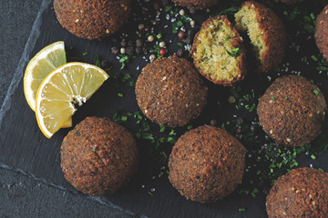 Falafel with sauce, spices and herbs. Middle Eastern cuisine.