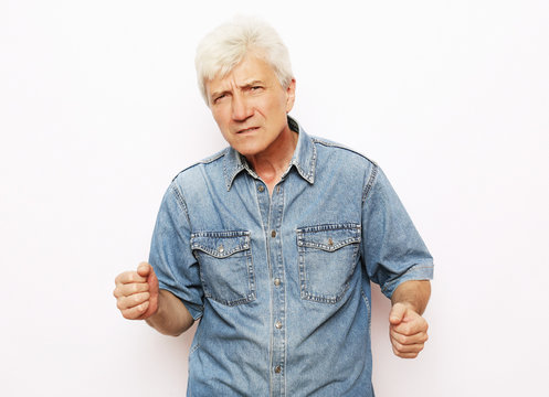 lifestyle and people concept: scared old man