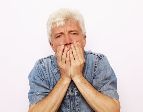 lifestyle and people concept: scared old man