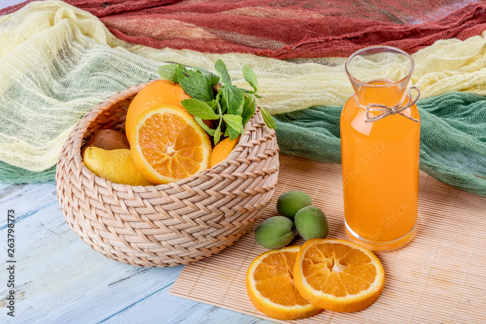 Wall mural fresh orange juice in the glass jar