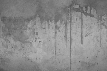 Texture of the old concrete wall with scratches, cracks, dust, crevices, roughness, stucco. Can be used as a poster or background for design. 