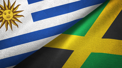 Uruguay and Jamaica two flags textile cloth, fabric texture