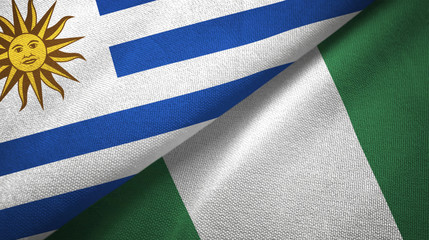 Uruguay and Nigeria two flags textile cloth, fabric texture