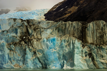 Fototapeta na wymiar Huge wall of glacial ice in Patagonia from the Andes mountain range.