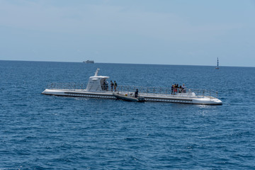 Fototapeta na wymiar Submarine ride for tourists off Waikiki Beach, Hawaii